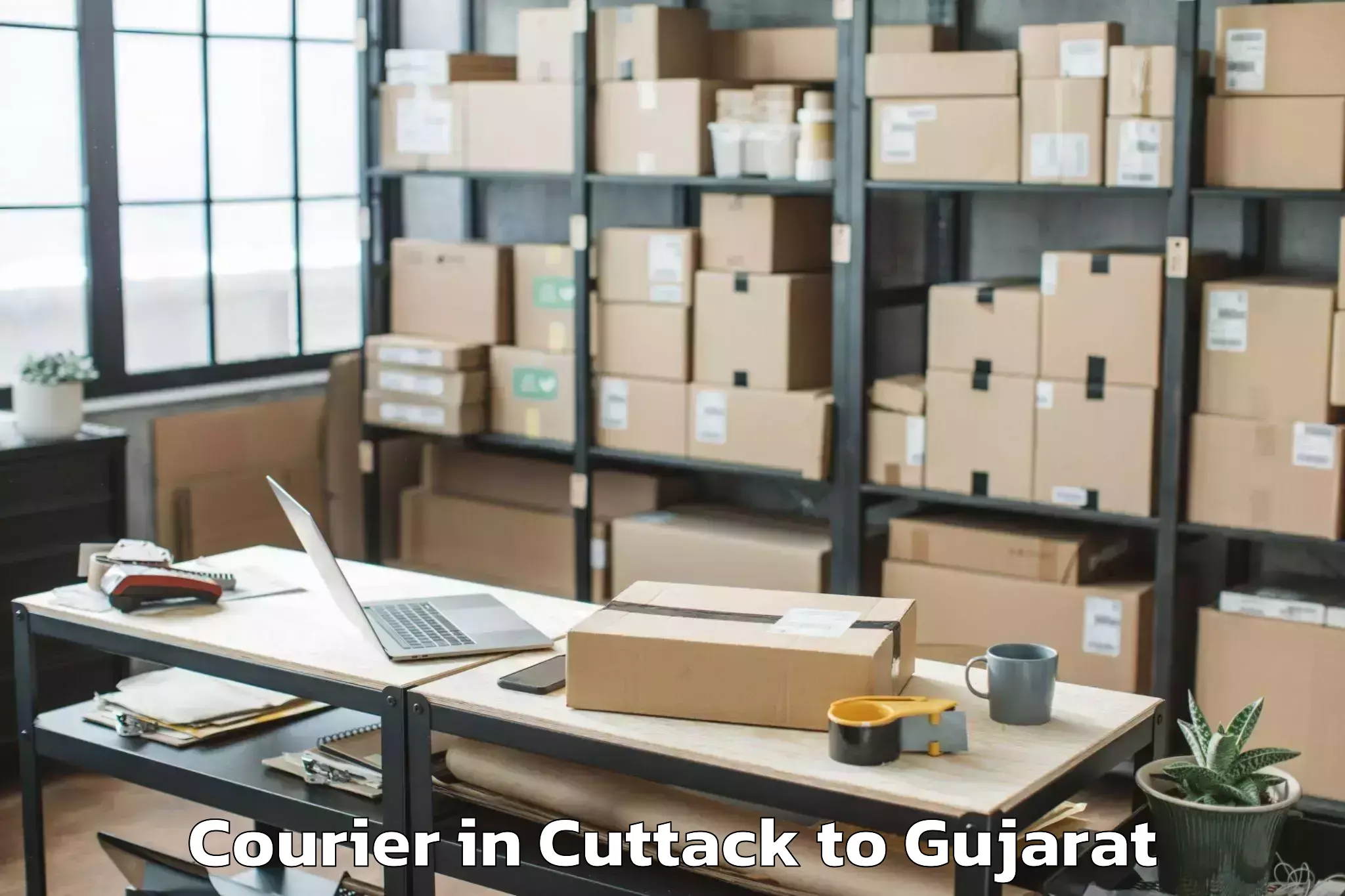 Professional Cuttack to Dhoraji Courier